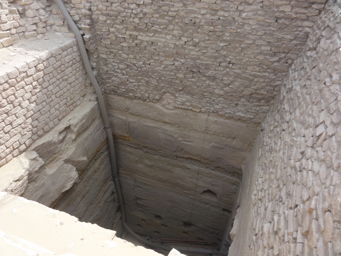A grain silo in the Step Pyramid complex.  Access to the bottom of the silo is from the steps in the pit next to it.
